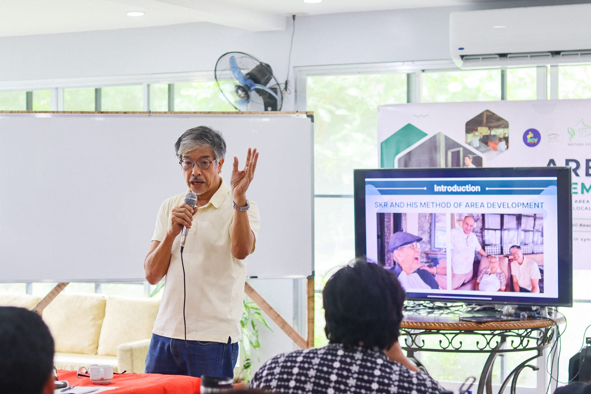 Community members engaged in local economic planning